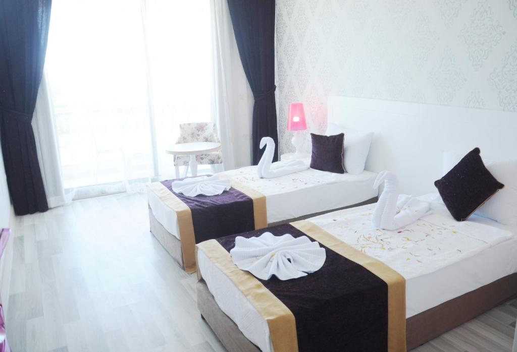 Raymar Hotels & Resorts Boztepe  Bilik gambar